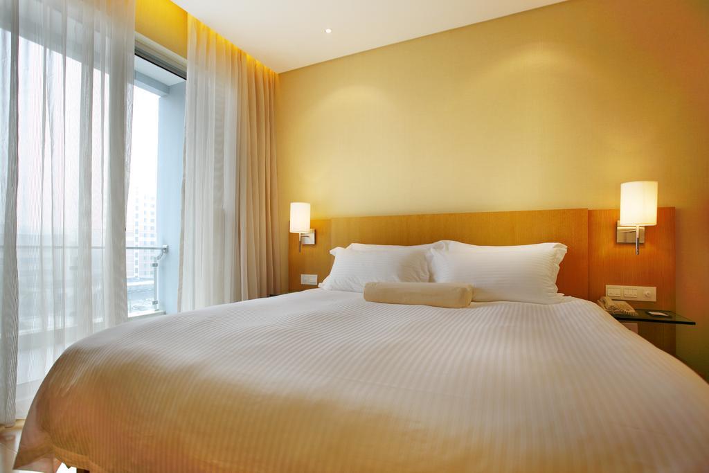 L'Otel Shanghai Cameră foto