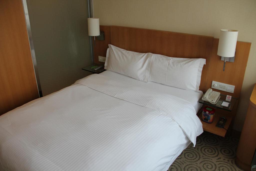 L'Otel Shanghai Cameră foto